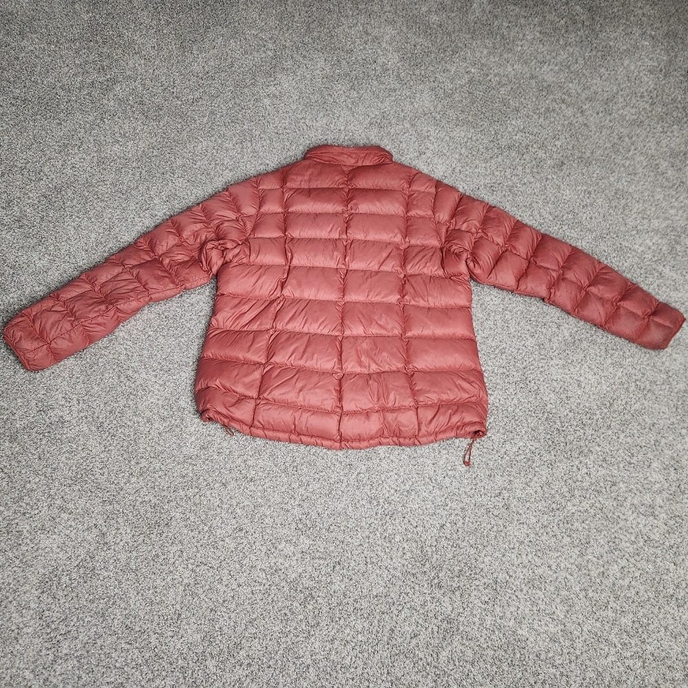 REI XXL Puffer Coat In Burnt Orange With Tiny Tear By Right Wrist
